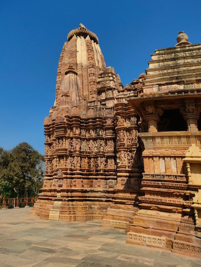 Explore the intricate carvings of the Khajuraho Temple, a UNESCO World Heritage site in India.